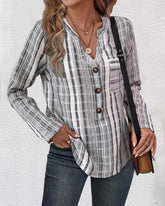 Blus med ledig stil och V-ringning och knappar